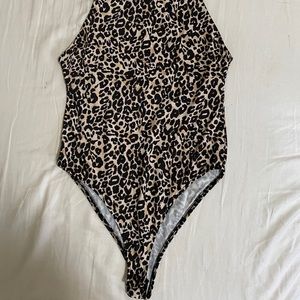 Zara animal print bodysuits.
